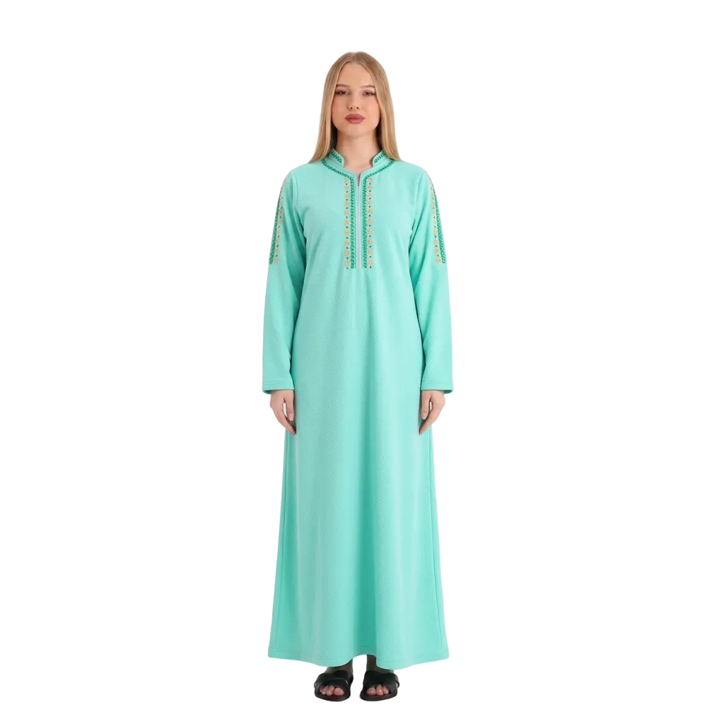 Our blonde model wearing the bright mint abaya on a white background