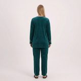 Back view of our blonde model in the teal pajama set