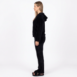 Side view of the model wearing the black set